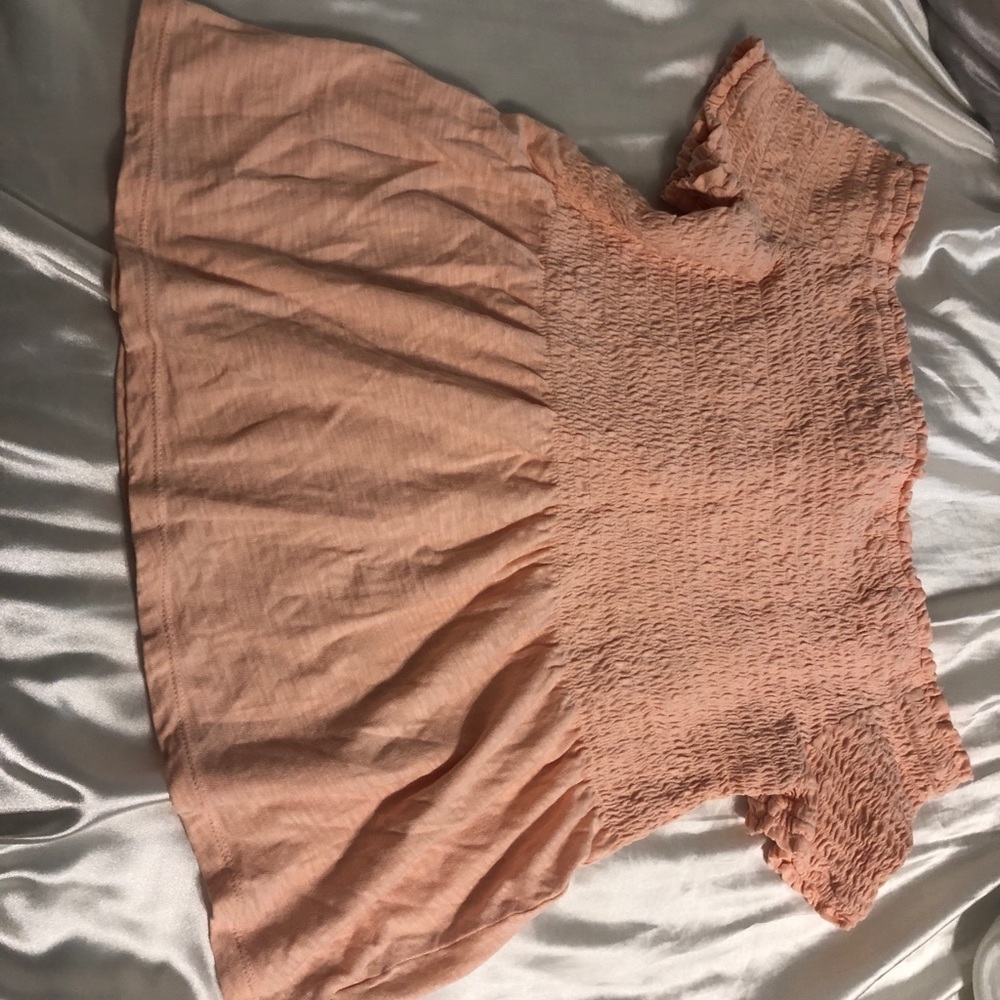 Off the shoulder peach colored smocked top
